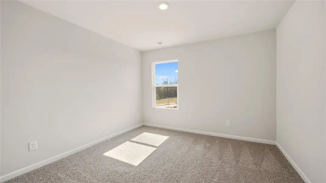 Spacious, unfurnished interior of a new home in Brookland Commons, Monroe (Image 22).