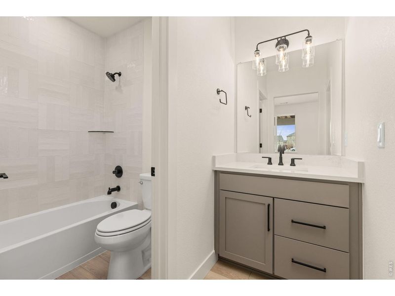 Furnished interior view inside a new home in RainDance, Windsor (Image 14).