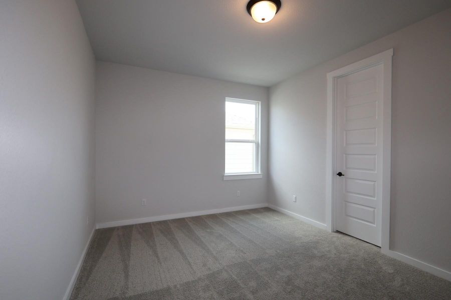 Spacious, unfurnished interior of a new home in Flora, Hutto (Image 11).
