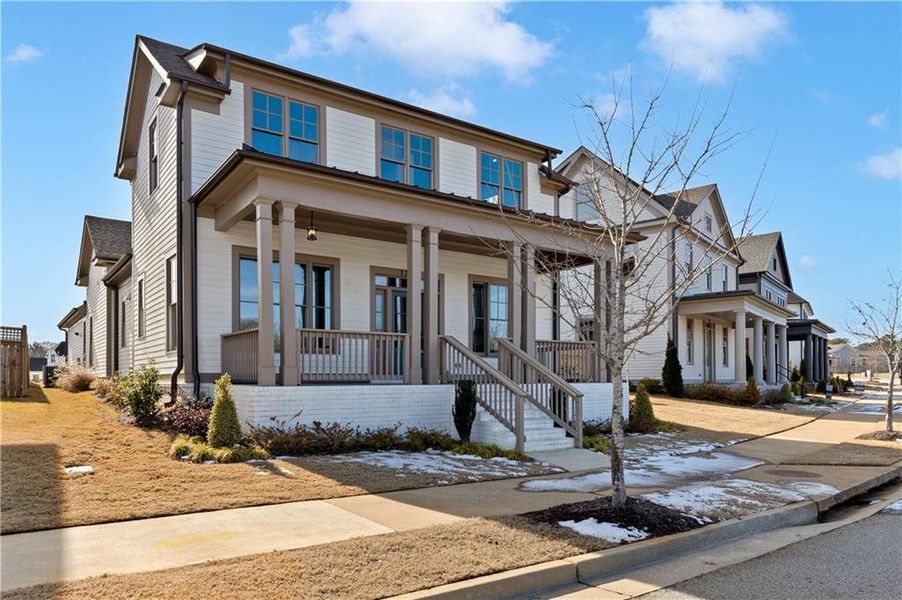 Front exterior of a new home in Eastmore, Conyers, GA, highlighting curb appeal (Image 28).