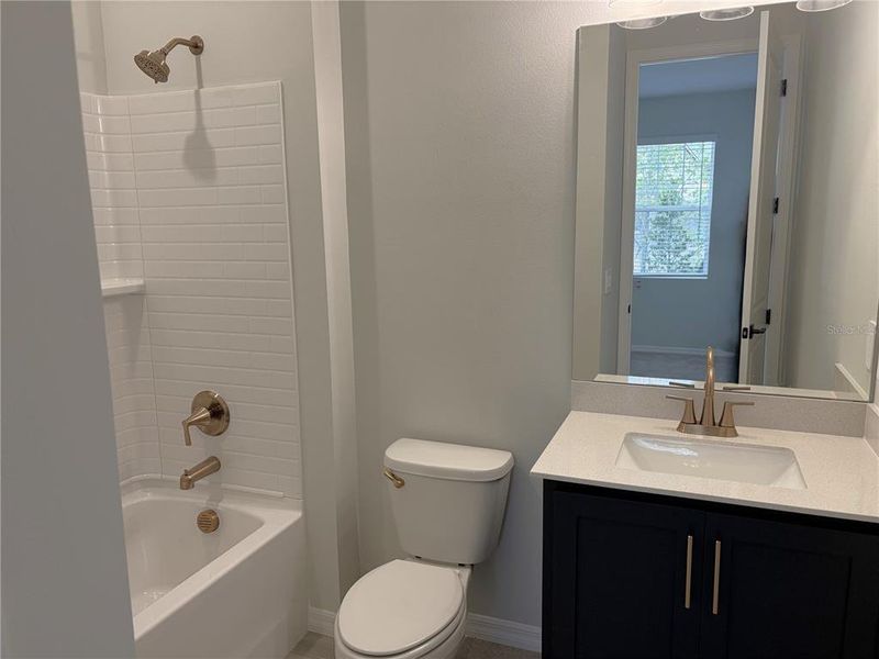 Furnished interior view inside a new home in Oakfield Trails, Parrish (Image 12).