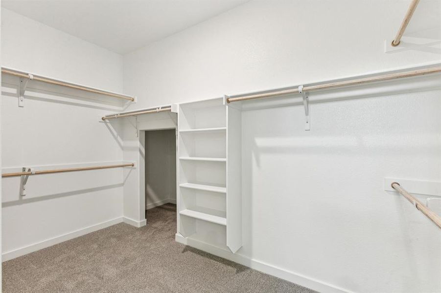 Primary Closet in the Wimbledon home plan by Trophy Signature Homes – REPRESENTATIVE PHOTO