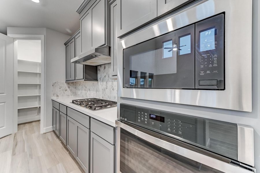 Furnished interior view inside a new home in , Cypress (Image 14).