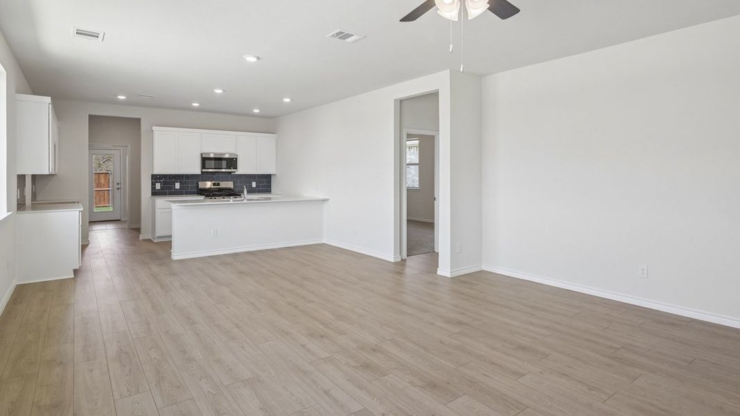Representative unfurnished interior of a home built from the Cambridge by D.R. Horton in Magnolia at Legacy Hills, Celina (Image 10).