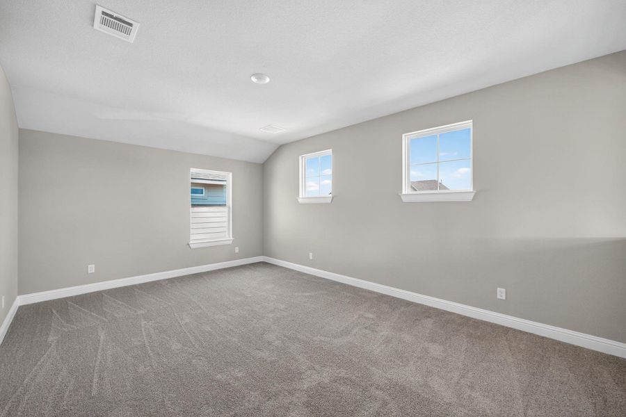 Unfurnished room featuring baseboards and light carpet Unfurnished room featuring baseboards and light carpet