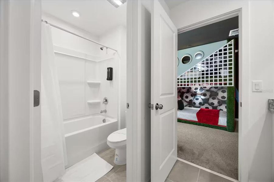 Furnished interior view inside a new home in Solara Resort, Kissimmee (Image 18).
