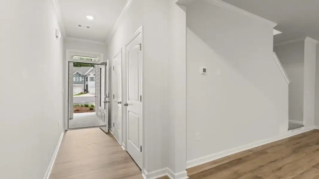 Spacious, unfurnished interior of a new home in Waypoint, Flowery Branch (Image 11).