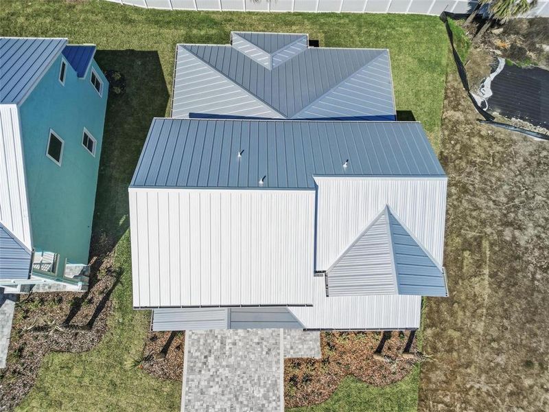 Exterior details and patio area of a home in Beachview Cove, Ormond Beach (Image 2).