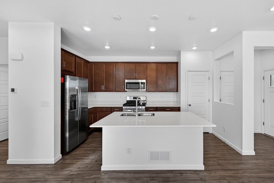 Furnished interior view inside a new home in The Aurora Highlands, Aurora (Image 5).