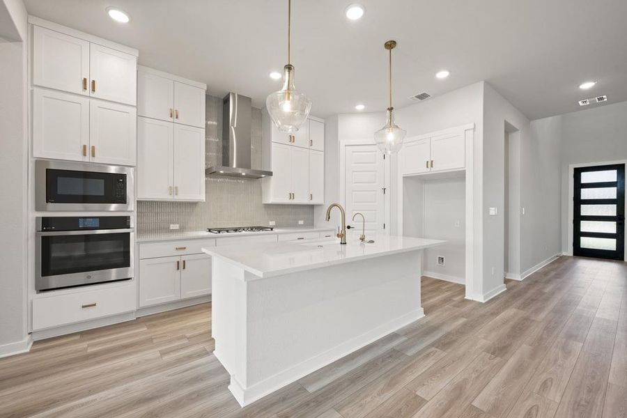 Furnished interior view inside a new home in Heritage, Dripping Springs (Image 7).
