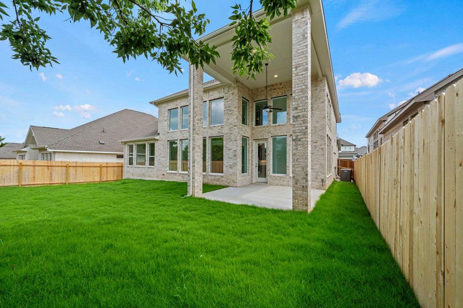Rear of Home and Private Backyard