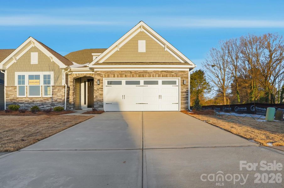 Homesite 4 features an Avery floorplan with an F elevation with a 2 car garage