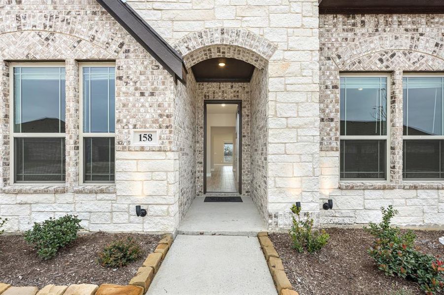 Exterior details and patio area of a home in Sunrise at Garden Valley, Waxahachie (Image 4).