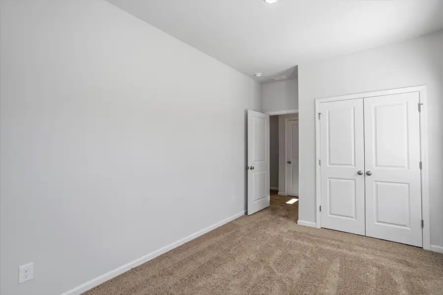 Spacious, unfurnished interior of a new home in West Main Townhomes, Sanford (Image 21).