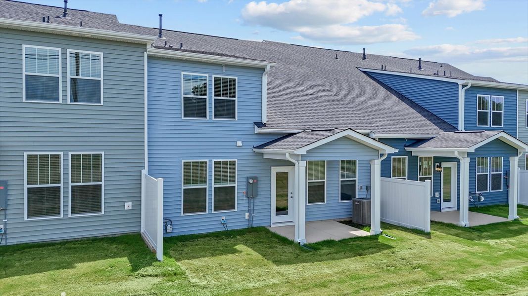 Elegant exterior with a rear covered porch perfect for relaxing or entertaining outdoors Elegant exterior with a rear covered porch perfect for relaxing or entertaining outdoors