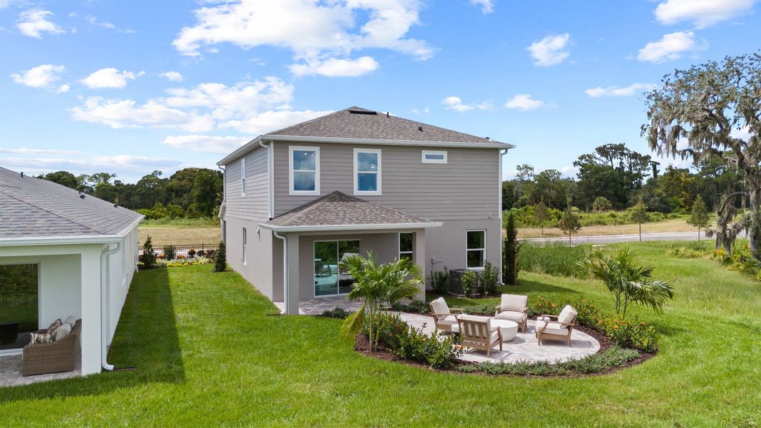 Representative exterior photo of a completed home built from the Ponte Verde by DRB Homes in Willowbrook North, Winter Haven, FL (Image 36). Representative exterior photo of a completed home built from the Ponte Verde by DRB Homes in Willowbrook North, Winter Haven, FL (Image 36).