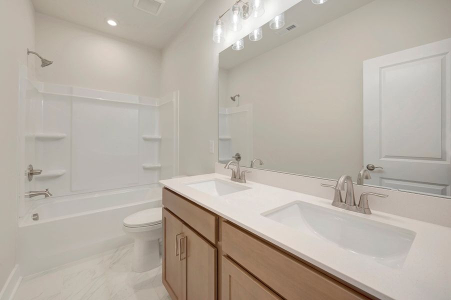 Furnished interior view inside a new home in Seven Oaks, Belmont (Image 9). Furnished interior view inside a new home in Seven Oaks, Belmont (Image 9).