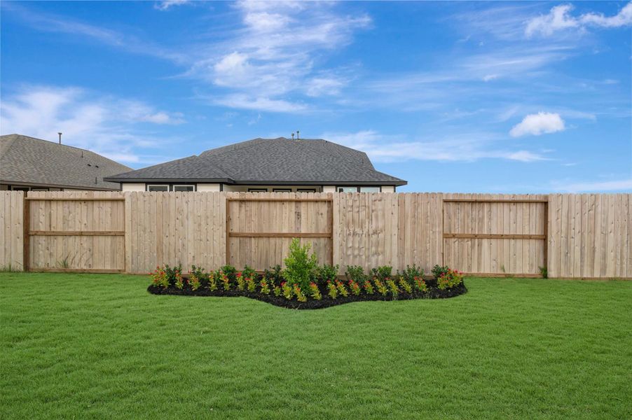 Lush landscaping in the backyard! Lush landscaping in the backyard!