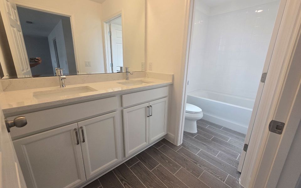 Modern Bathroom with Stylish Fixtures in Central Florida Home