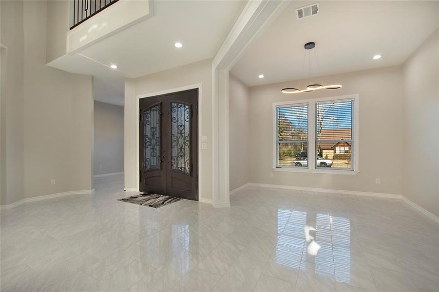 Foyer entrance with french doors