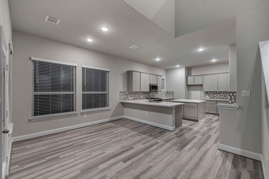 Representative furnished interior of a home built from the Shenandoah – 50′ Lot by Chesmar Homes in Blue Heron, Mont Belvieu (Image 3).