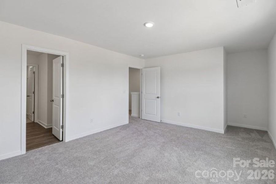 Spacious, unfurnished interior of a new home in Grover Walk, Grover (Image 12).