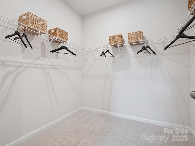 Oversized Primary Walk-In Closet Oversized Primary Walk-In Closet