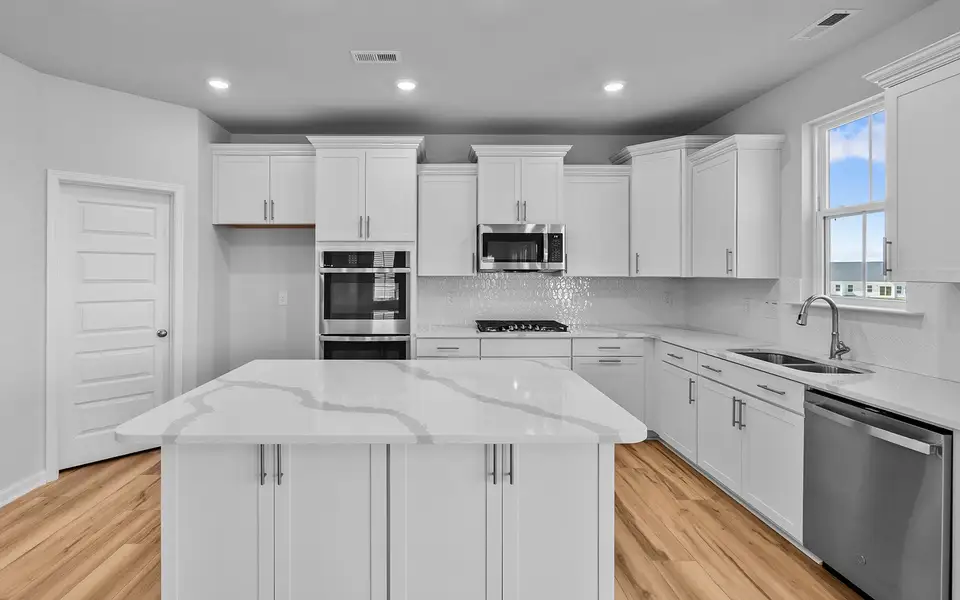 Furnished interior view inside a new home in Fieldstone, Lexington (Image 6).