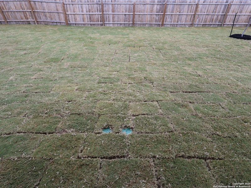 Exterior details and patio area of a home in Winding Brook, San Antonio (Image 4).