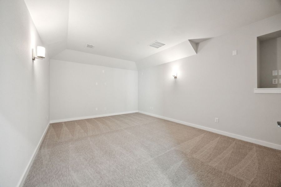 Media Room in the Wimbledon home plan by Trophy Signature Homes – REPRESENTATIVE PHOTO