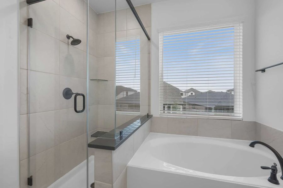 Representative furnished interior of a home built from the Chantilly 2 by Chesmar Homes in Meridiana Chateau, Manvel (Image 5).
