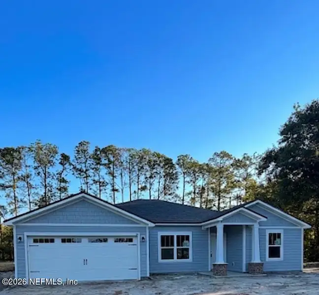 Front exterior of a new home in , Jacksonville, FL, highlighting curb appeal (Image 1). Front exterior of a new home in , Jacksonville, FL, highlighting curb appeal (Image 1).