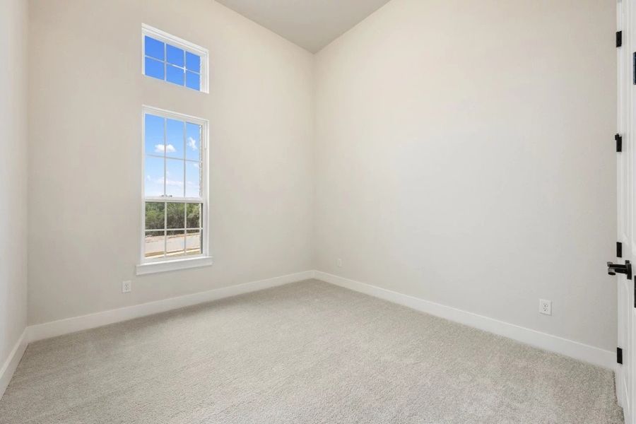 Spacious, unfurnished interior of a new home in The Estates at La Cima, San Marcos (Image 44).