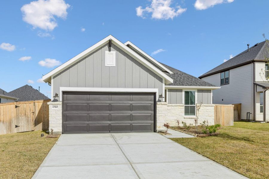 Front exterior of a new home in Windcress, Cove, TX, highlighting curb appeal (Image 1). Front exterior of a new home in Windcress, Cove, TX, highlighting curb appeal (Image 1).