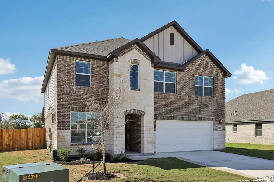 Front exterior of a new home in Carmel Ranch, Schertz, TX, highlighting curb appeal (Image 1).