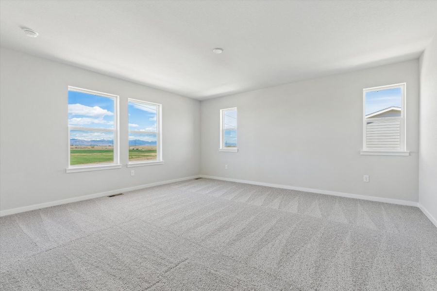 A room with a large window. A room with a large window.