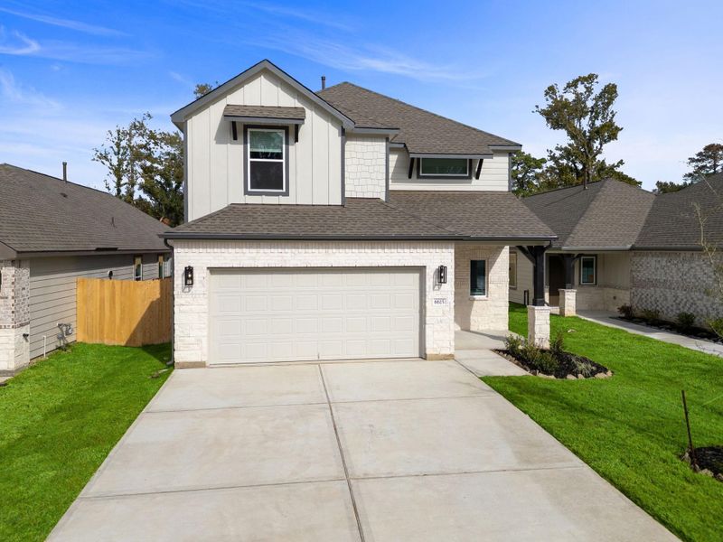 Front exterior of a new home in Cypresswood Landing, Humble, TX, highlighting curb appeal (Image 13). Front exterior of a new home in Cypresswood Landing, Humble, TX, highlighting curb appeal (Image 13).