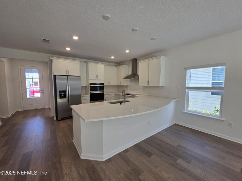 Furnished interior view inside a new home in Hyland Trail, Green Cove Springs (Image 10).