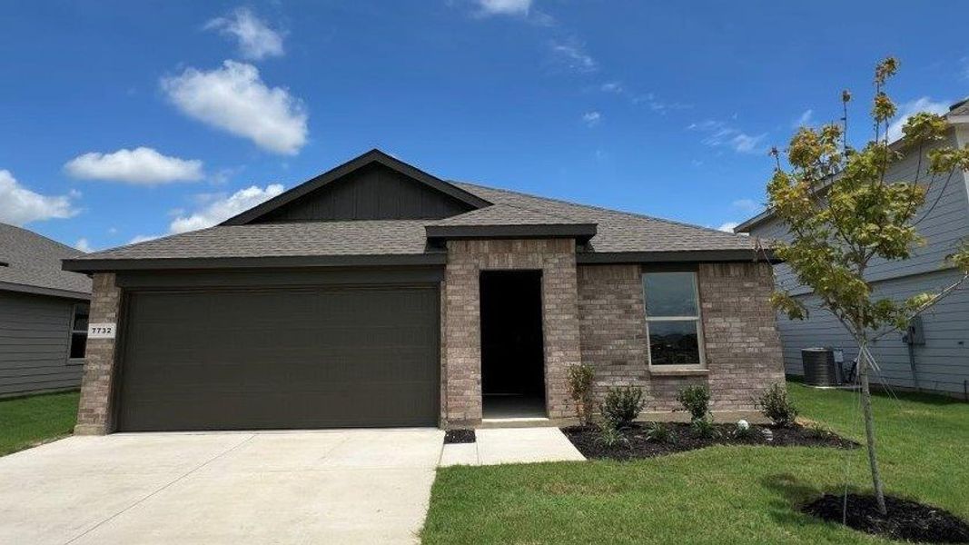Front exterior of a new home in Monarch at the Meadows, Ponder, TX, highlighting curb appeal (Image 1). Front exterior of a new home in Monarch at the Meadows, Ponder, TX, highlighting curb appeal (Image 1).