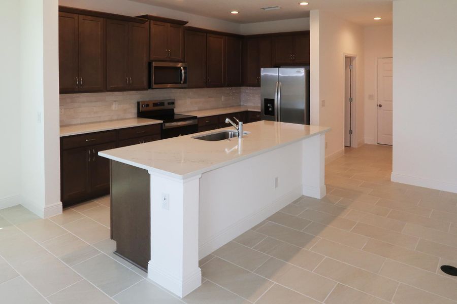 Furnished interior view inside a new home in Ridgeview, Clermont (Image 12).