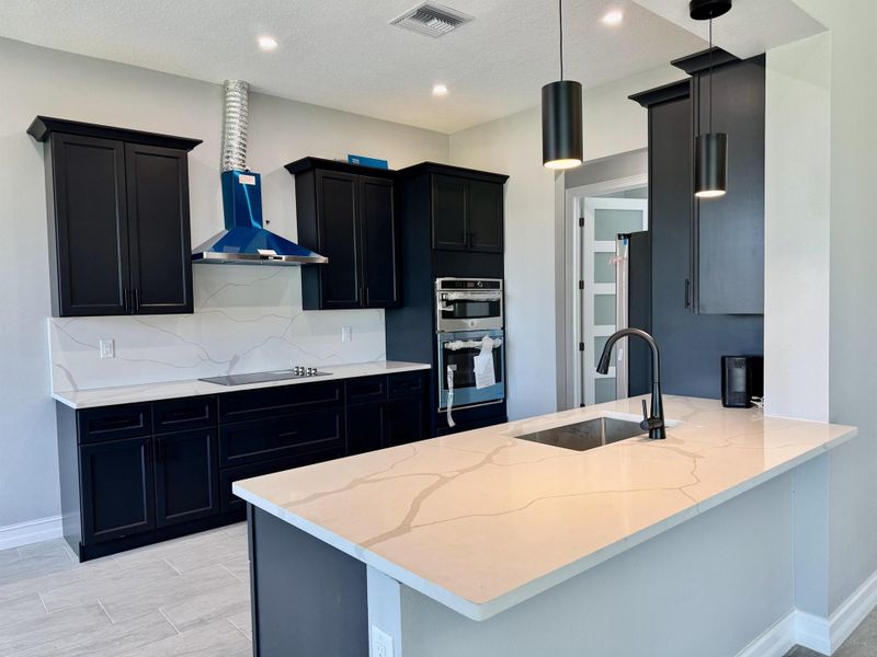 Furnished interior view inside a new home in , Okeechobee (Image 8).