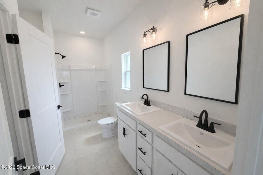Furnished interior view inside a new home in St. John's Preserve, Palm Bay (Image 12).