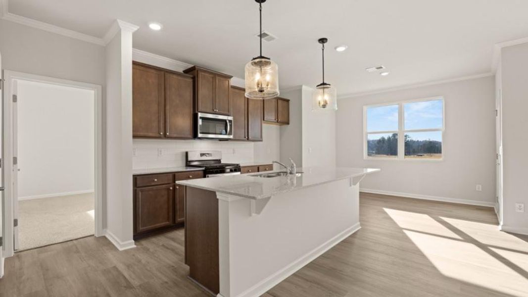 Furnished interior view inside a new home in Fairway 17 at Mirror Lake, Villa Rica (Image 11).