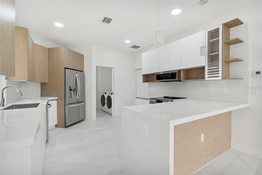 Furnished interior view inside a new home in , North Port (Image 9).