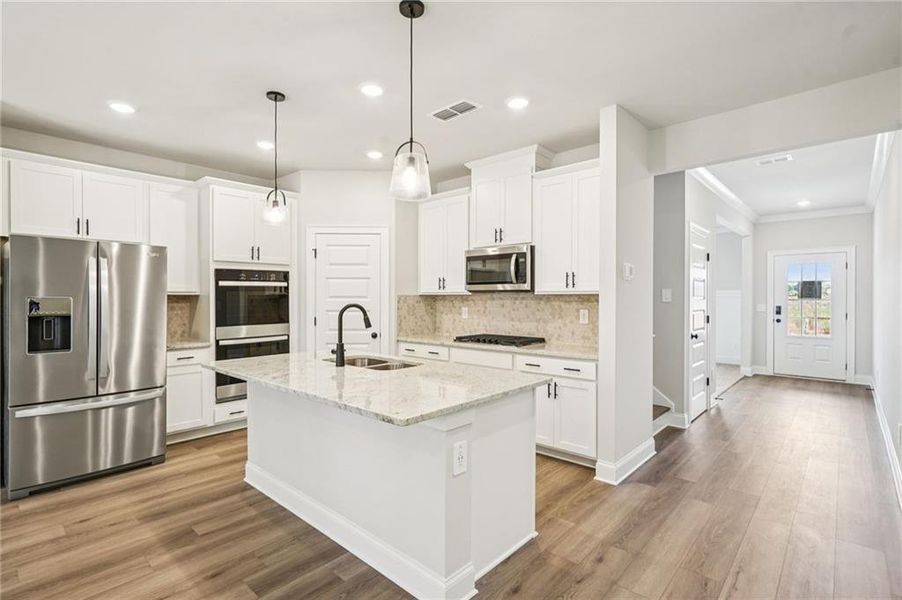 Furnished interior view inside a new home in Martin Springs - Estate Series, Lawrenceville (Image 8).