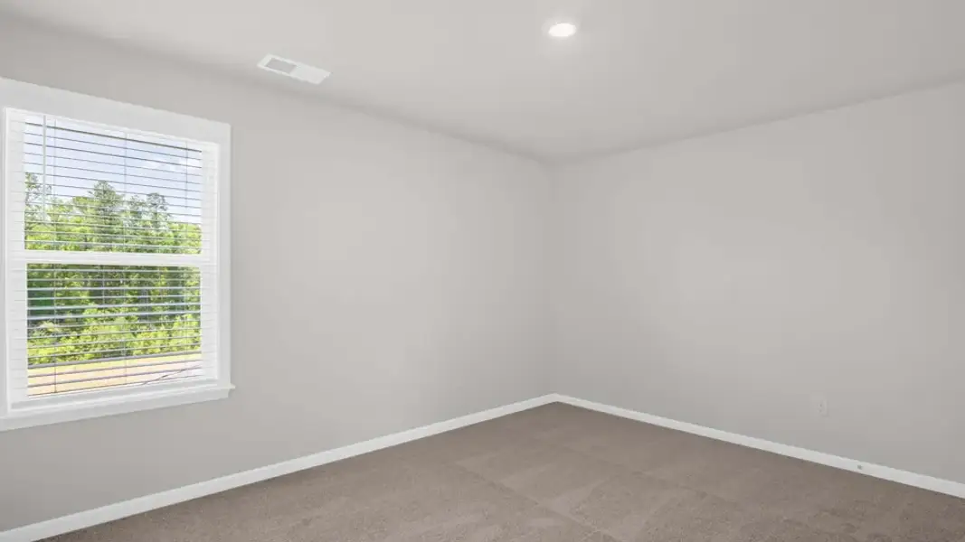 Spacious, unfurnished interior of a new home in The Estates Park, Apex (Image 30).