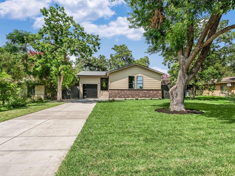 Front exterior of a new home in , Austin, TX, highlighting curb appeal (Image 17).