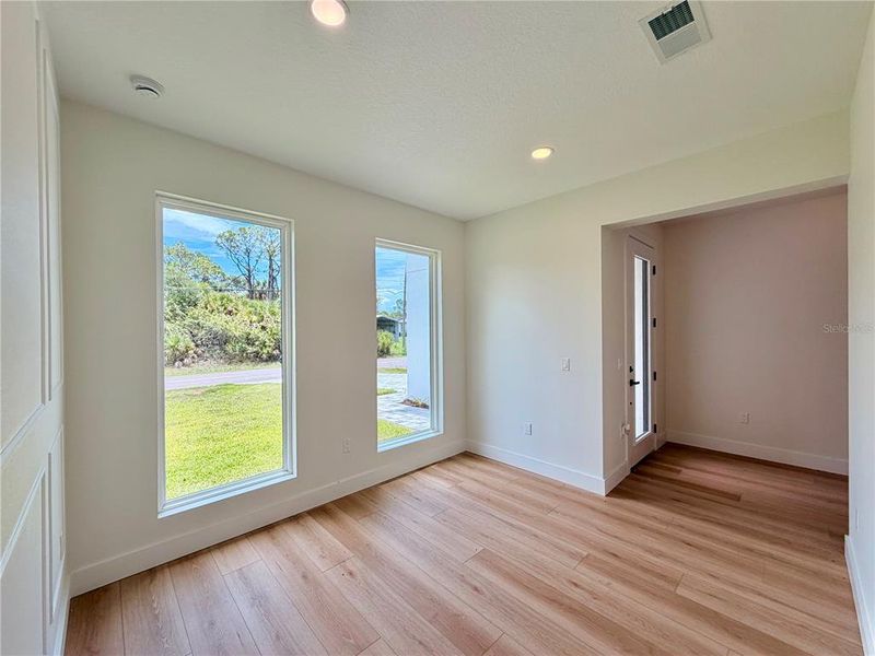 Spacious, unfurnished interior of a new home in , Port Charlotte (Image 27).