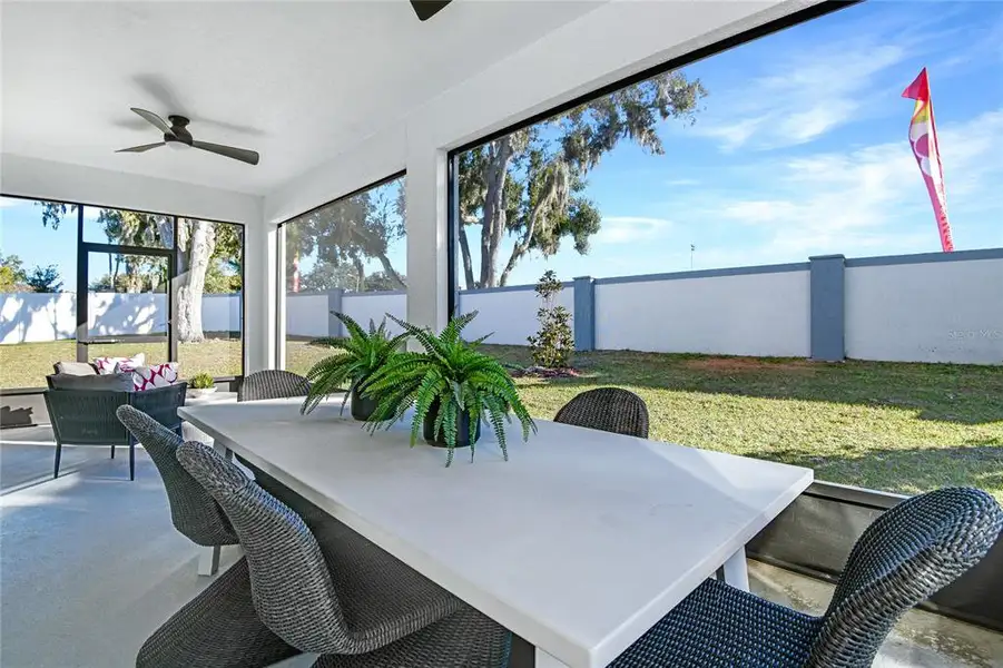 Exterior details and patio area of a home in Seaport Village, Tavares (Image 3).