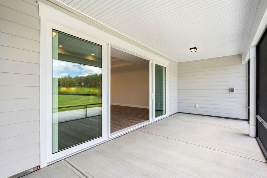 Exterior details and patio area of a home in Del Webb Savannah at Heartwood, Richmond Hill (Image 3).